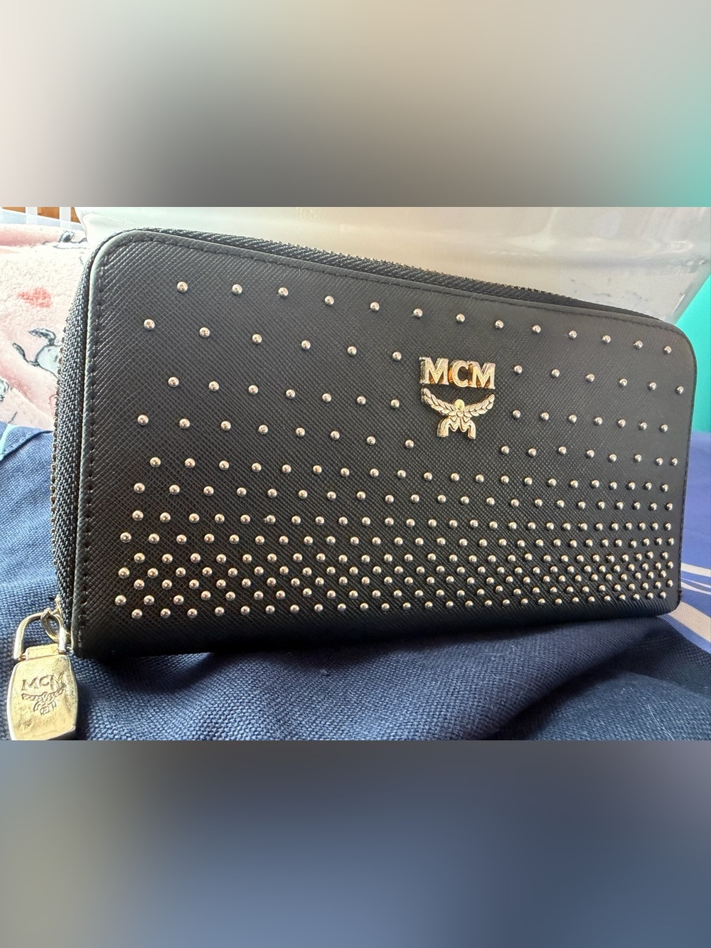 EUC - MCM Black Studded Zip-Around Wallet with Gold Logo